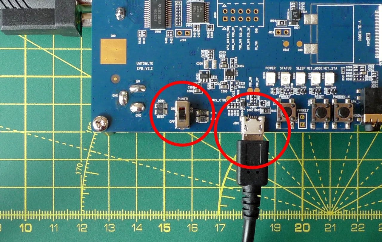 Connect the EVB's micro USB connector to a five volt AC adapter and push the power switch.
