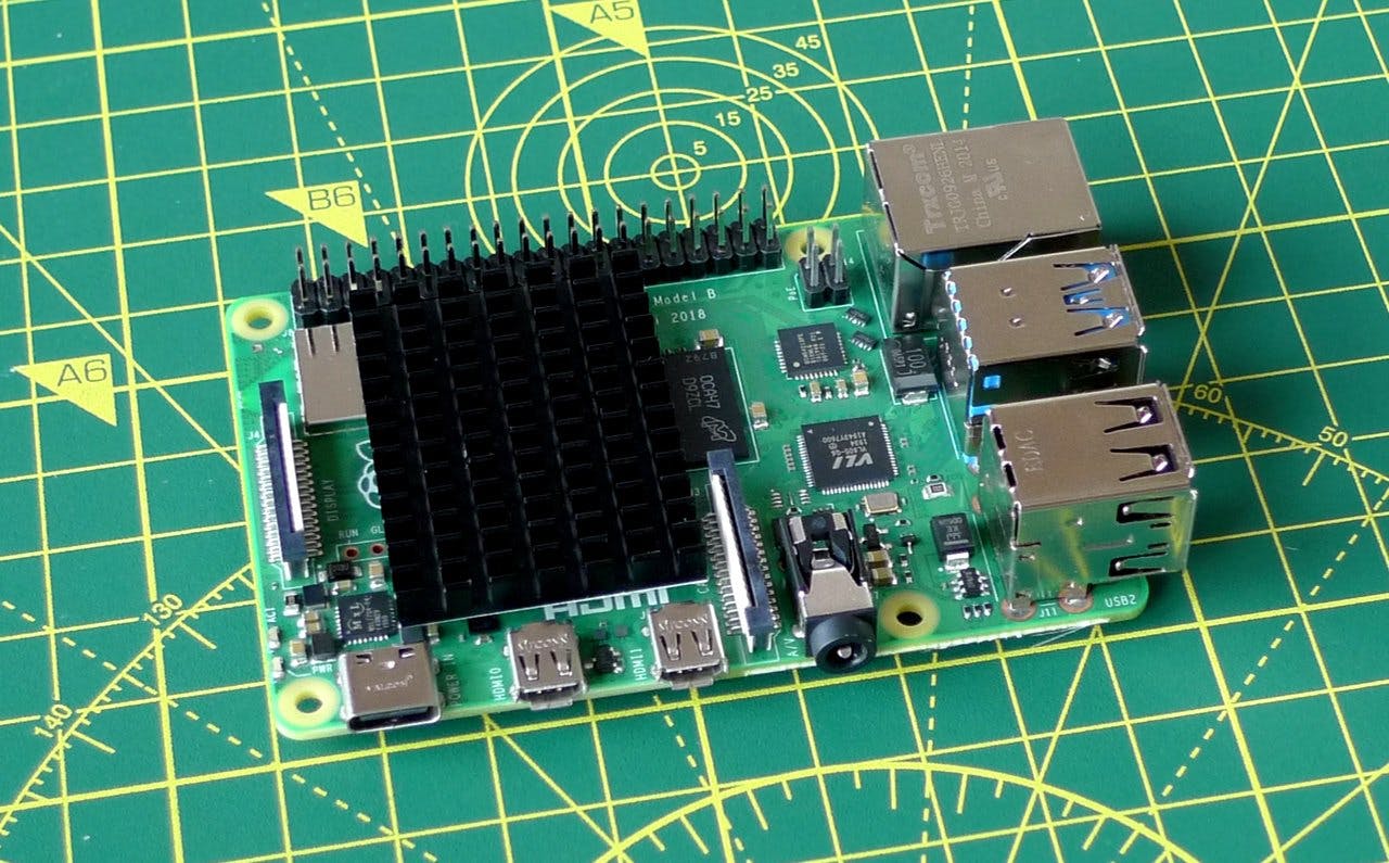 The Raspberry Pi with GPIO extender and optional heatsink.