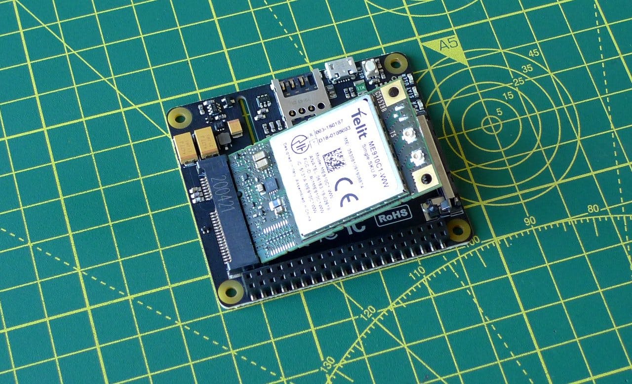 Slot the modem card into the Base Hat.