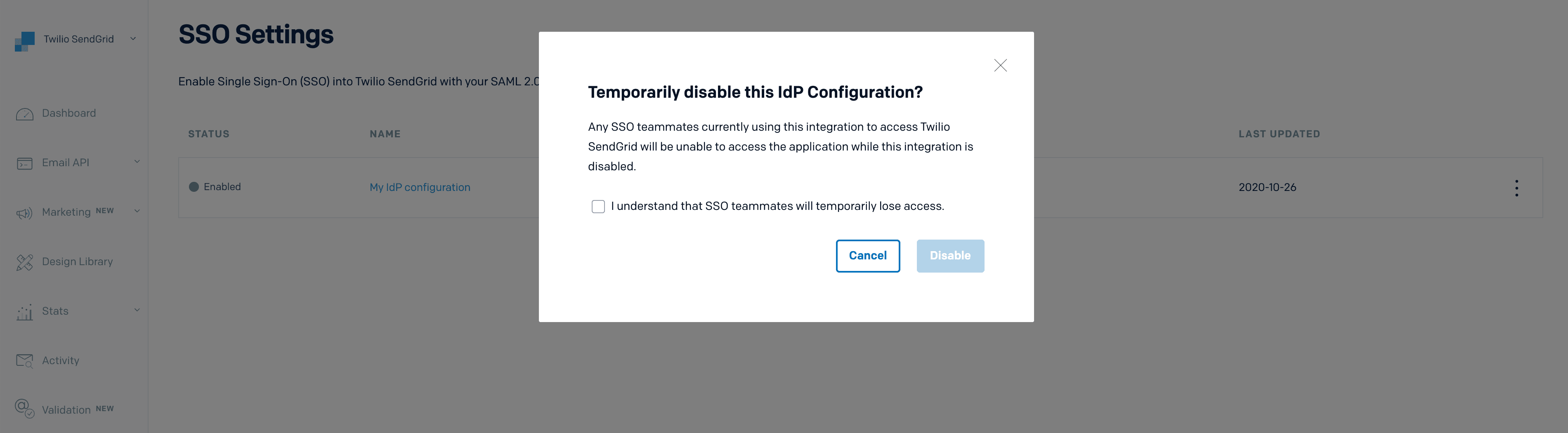 Confirmation modal to disable Twilio SendGrid IdP configuration with cancel and disable options.