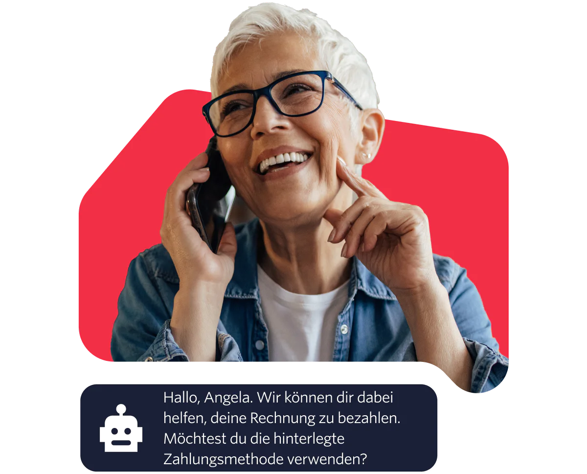 Elderly woman with glasses smiling while talking on the phone against a red background. Elderly woman with glasses smiling while talking on the phone against a red background.
