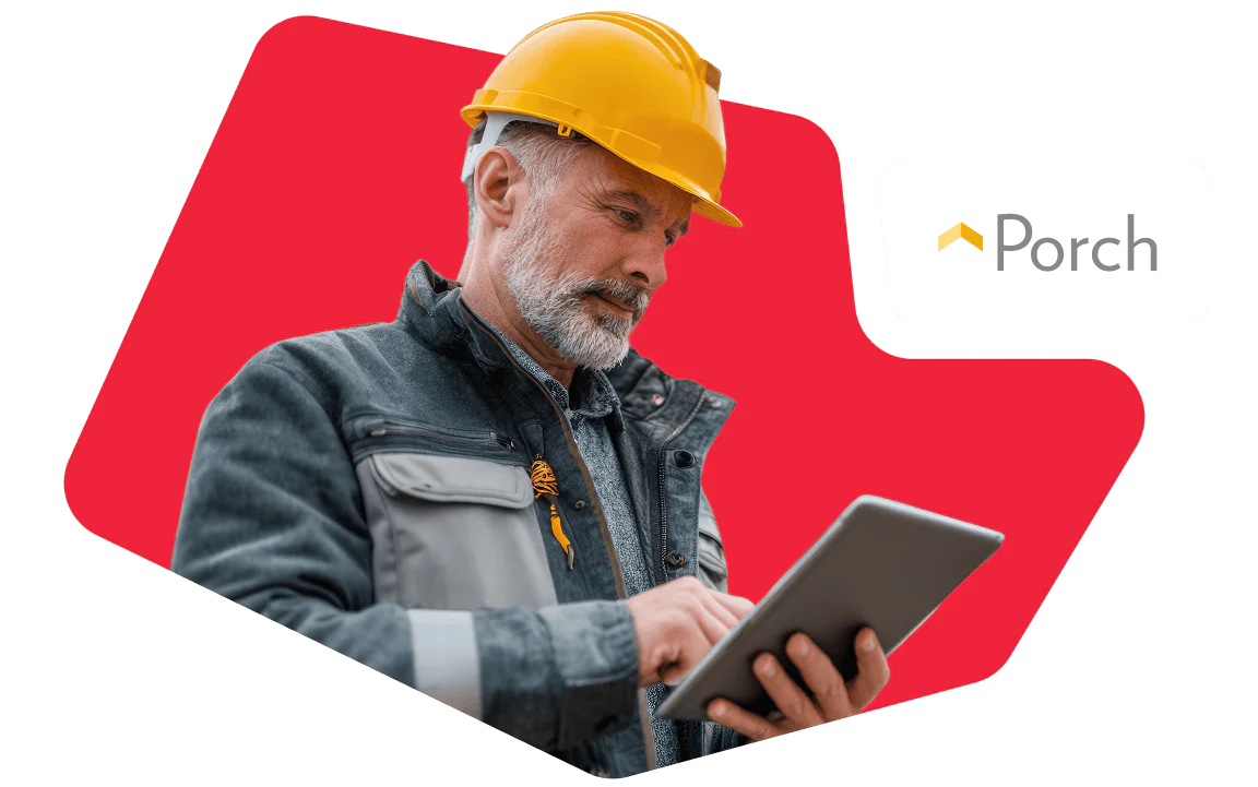 A construction worker in a yellow helmet using a tablet, with the Porch logo in the background.