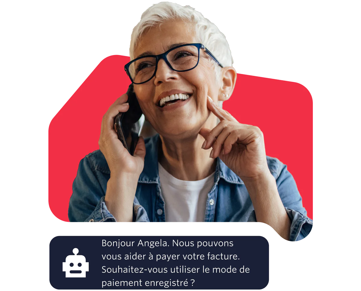 Elderly woman with glasses smiling while talking on the phone against a red background. Elderly woman with glasses smiling while talking on the phone against a red background.