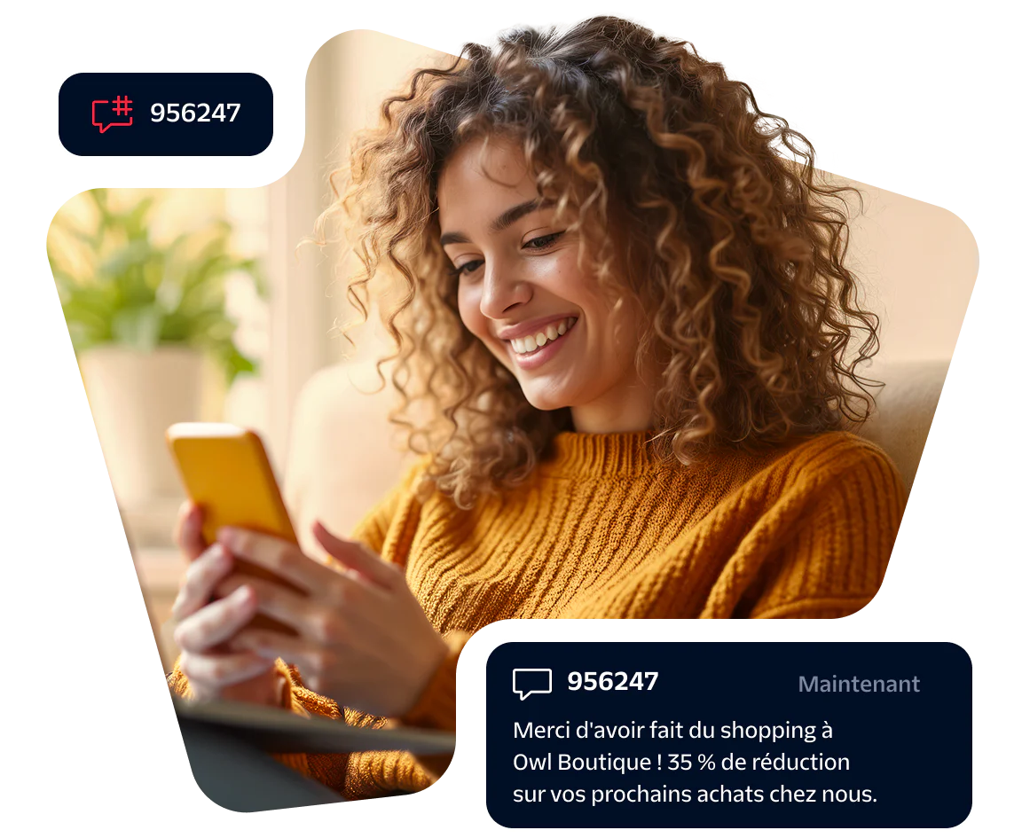 Smiling woman looking at smartphone with discount notification popup on screen.
