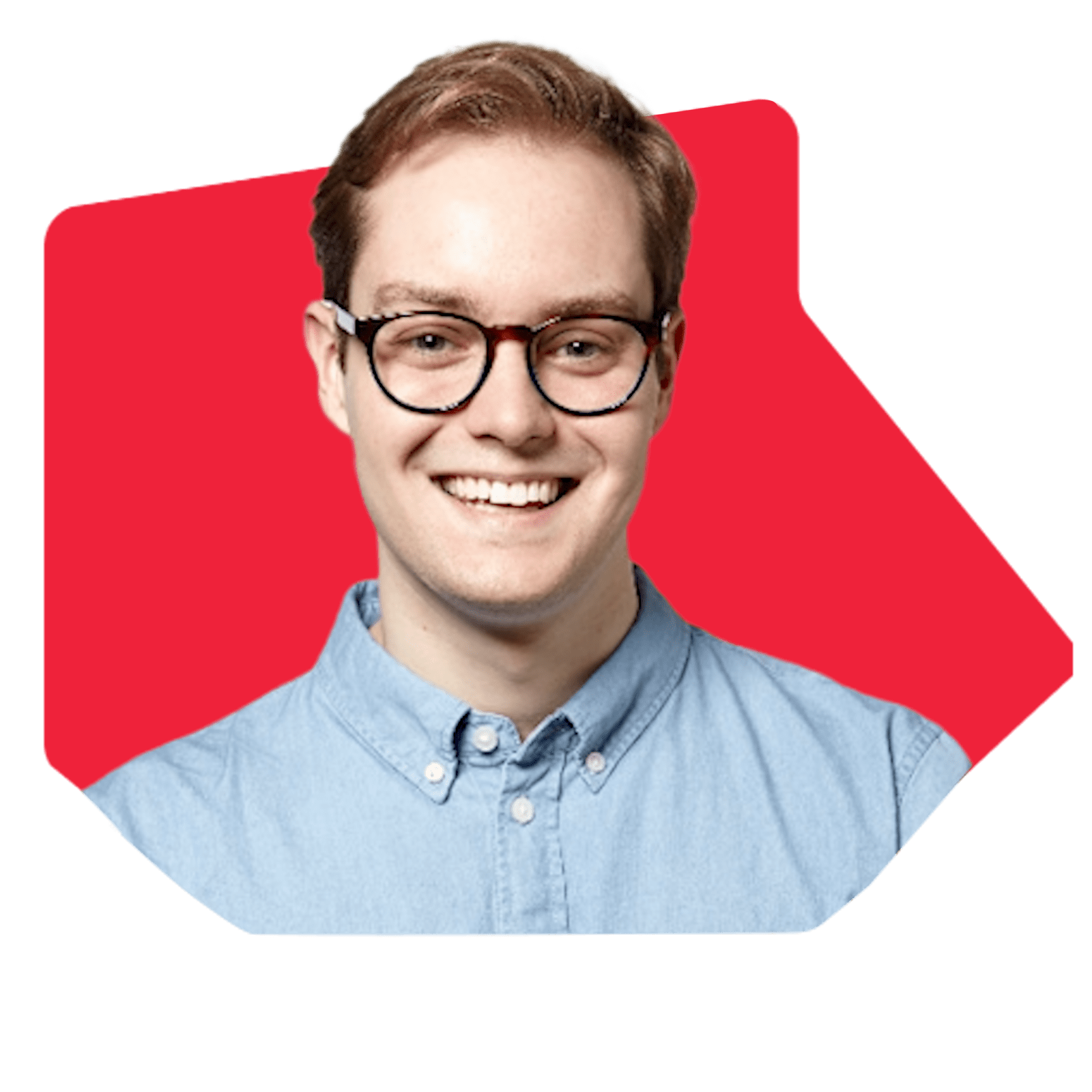 Man with light hair, glasses, and blue shirt smiling against a red background