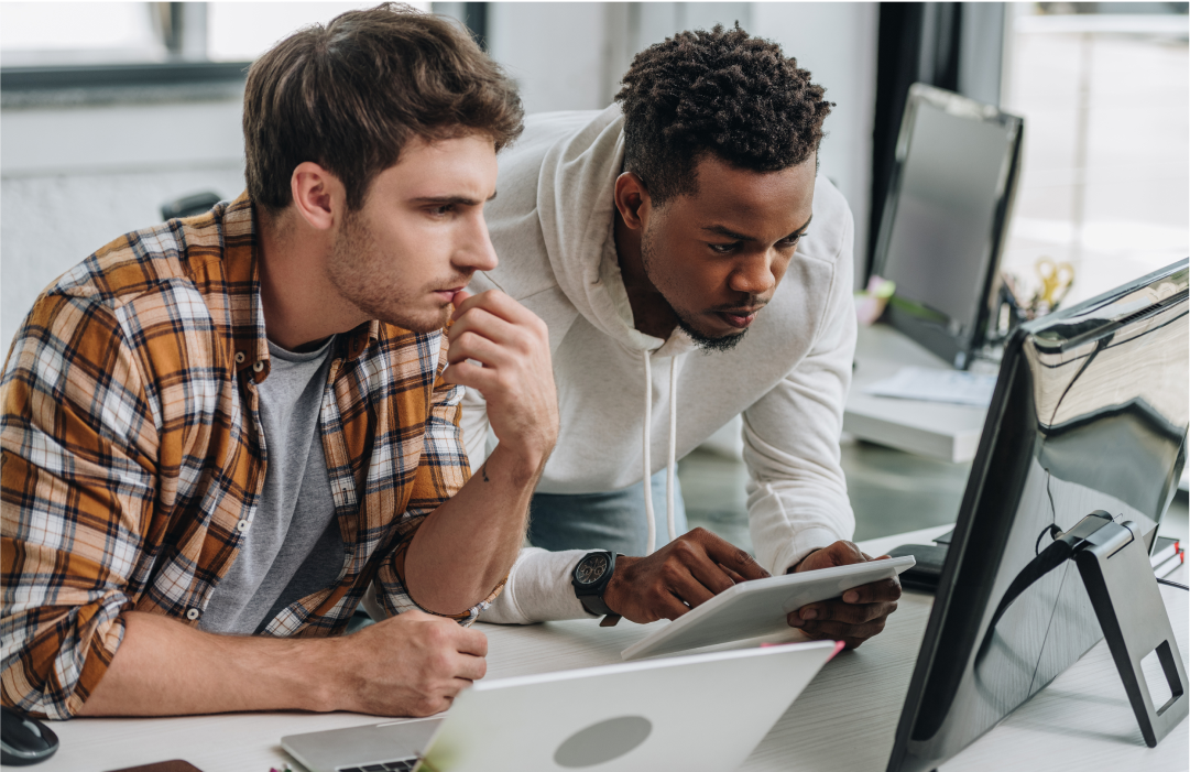 Developers checking GitHub actions on laptop after receiving SMS alert