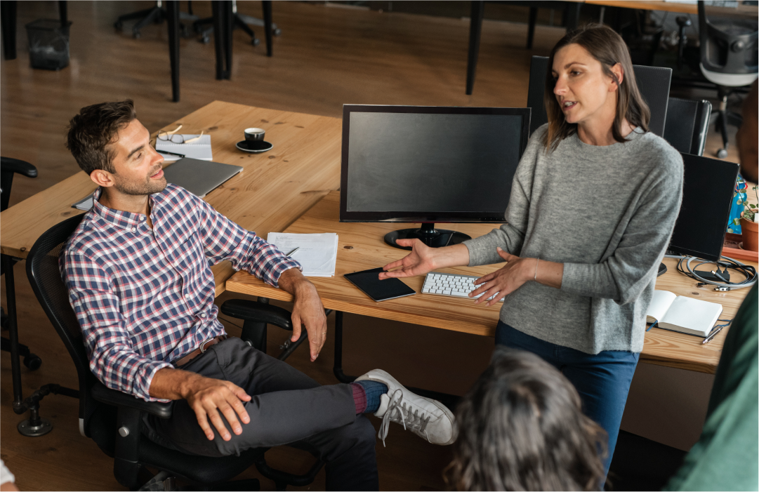 Developer coworkers discussing Video and WebRTC