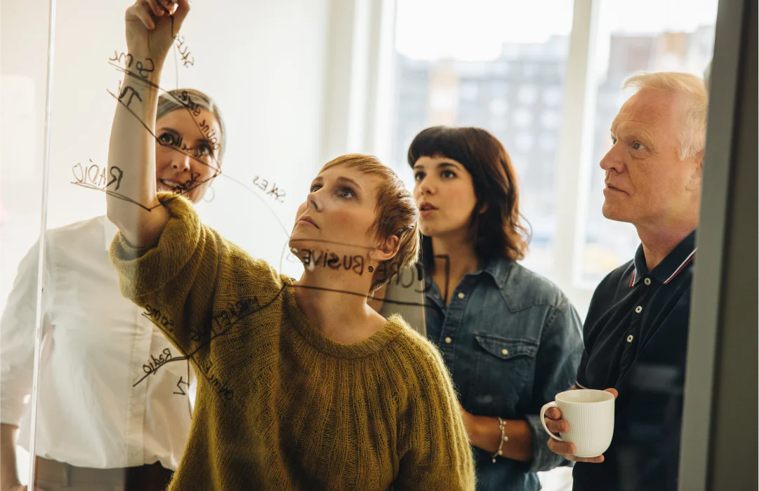 Team analyzing the benefits of integrating Twilio Flex and Calendly