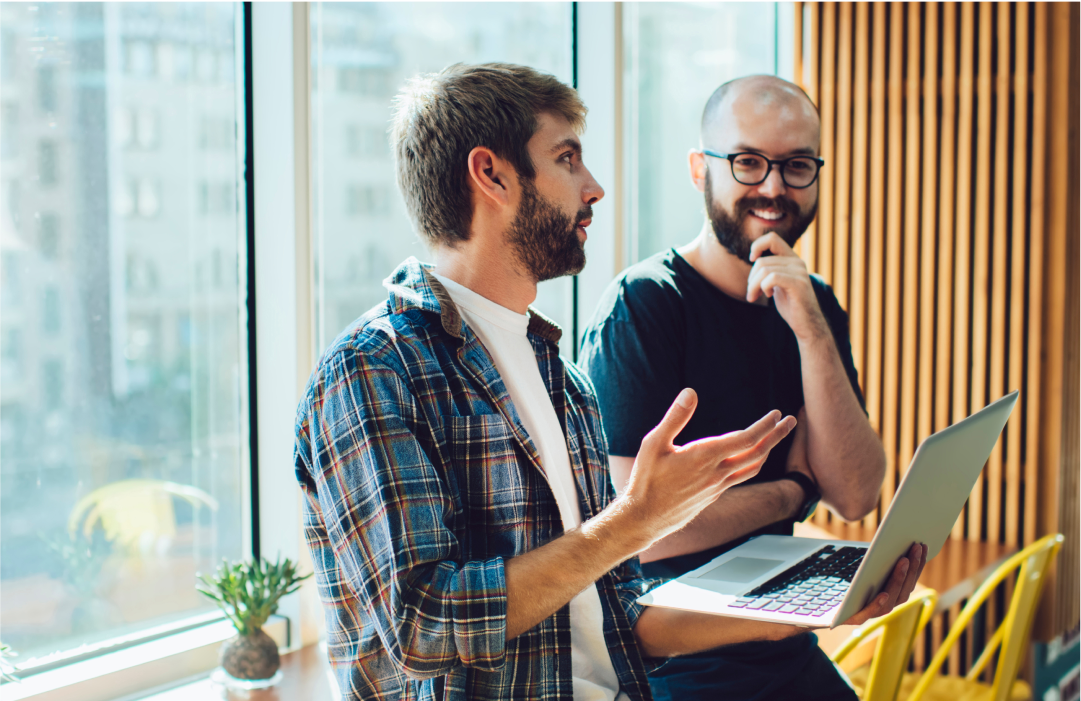 Two colleagues debugging software