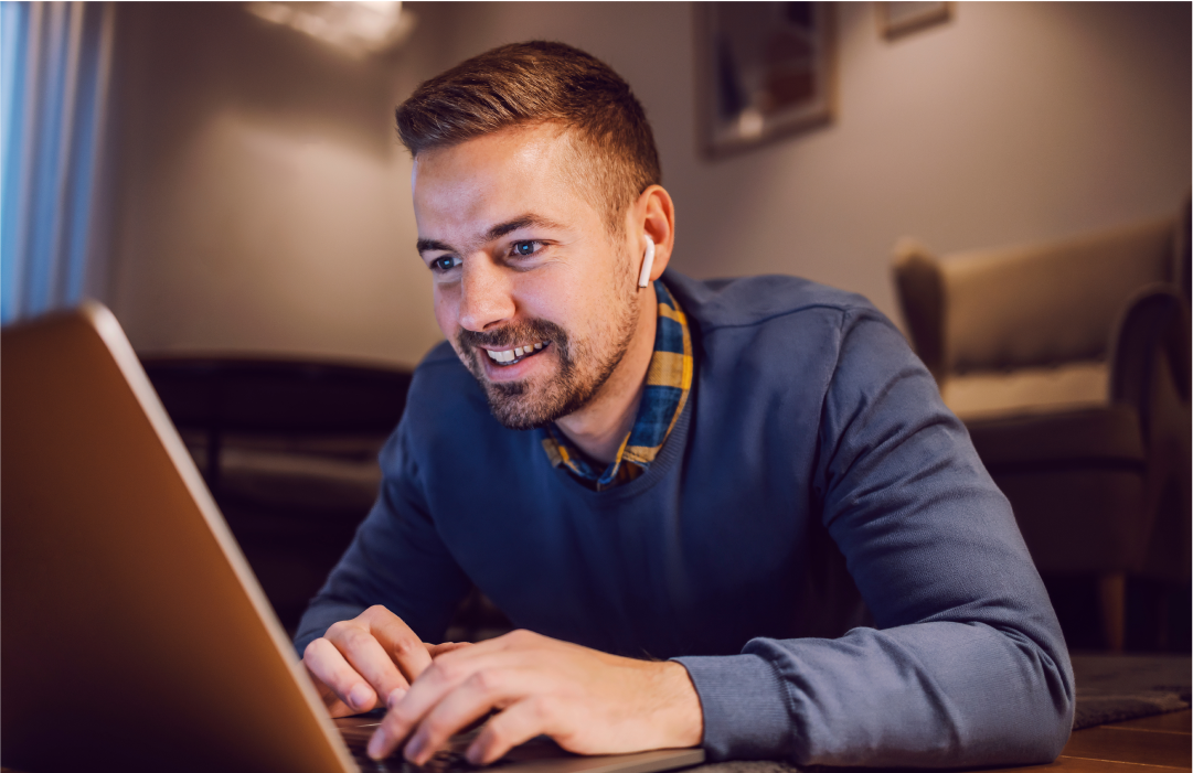 Man concentrates on a laptop screen