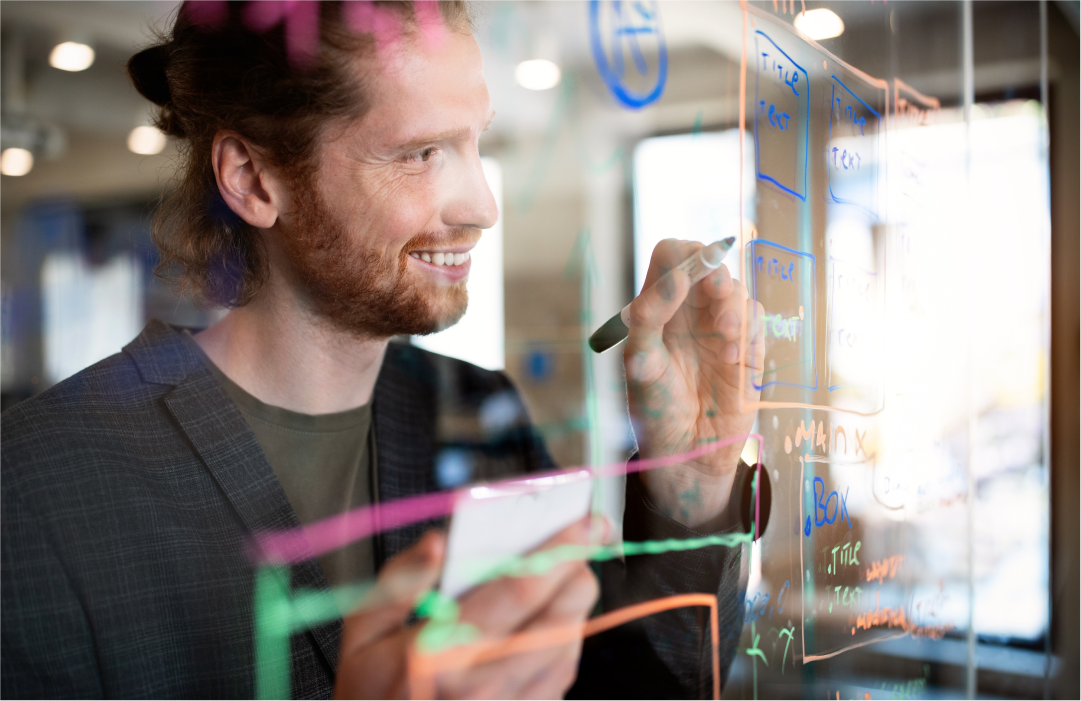 Marketer planning out campaigns to be scheduled and tracked on a board