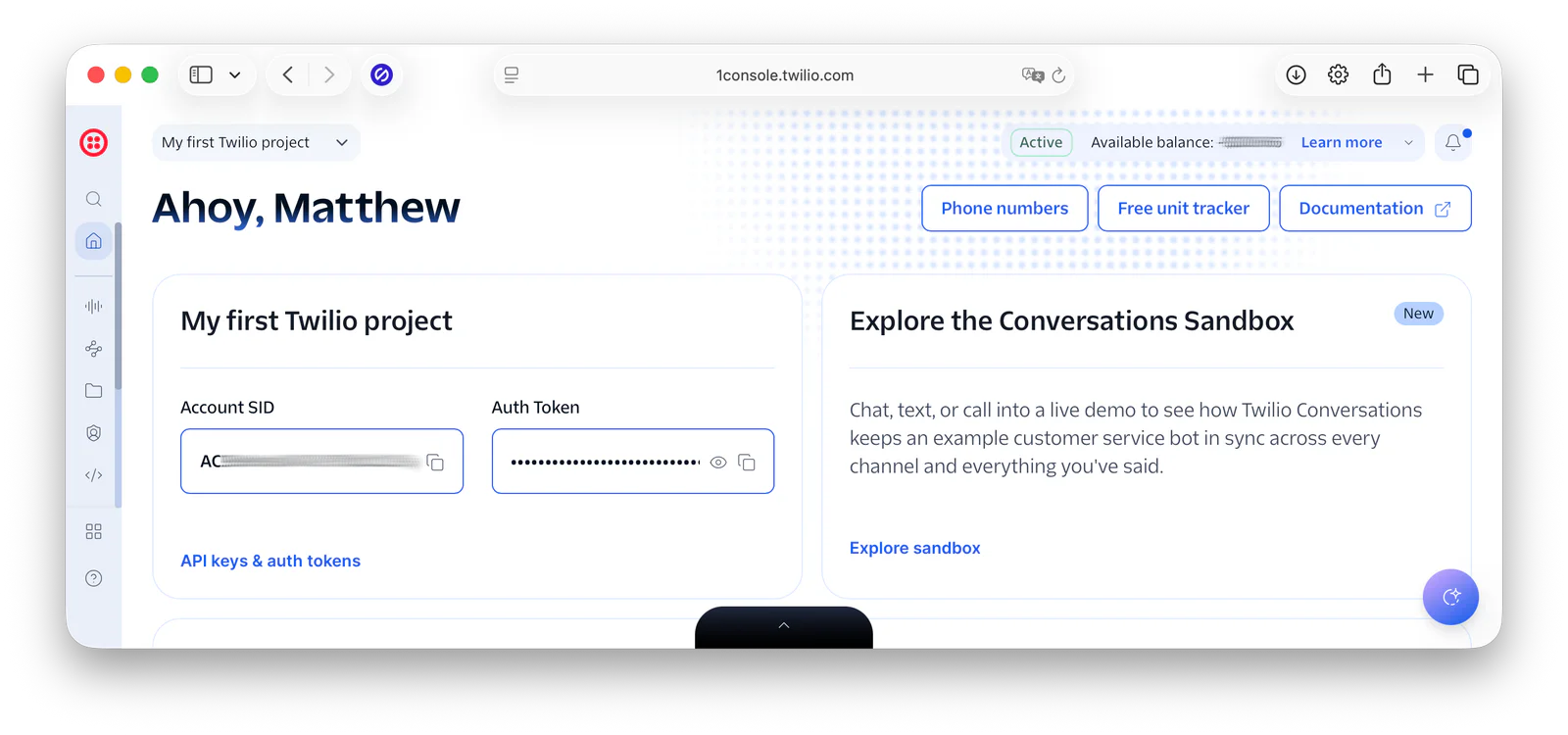 Twilio console with account information, balance, and project details displayed on a desktop browser.