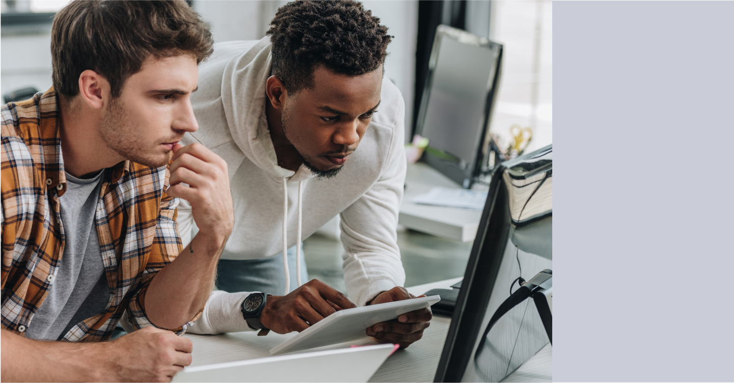 Developers checking GitHub actions on laptop after receiving SMS alert