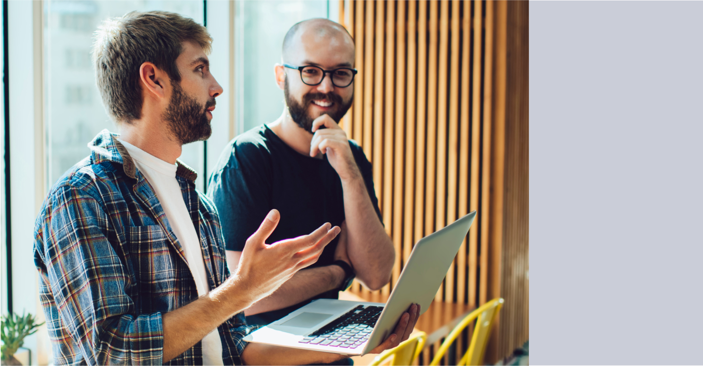 Two colleagues debugging software