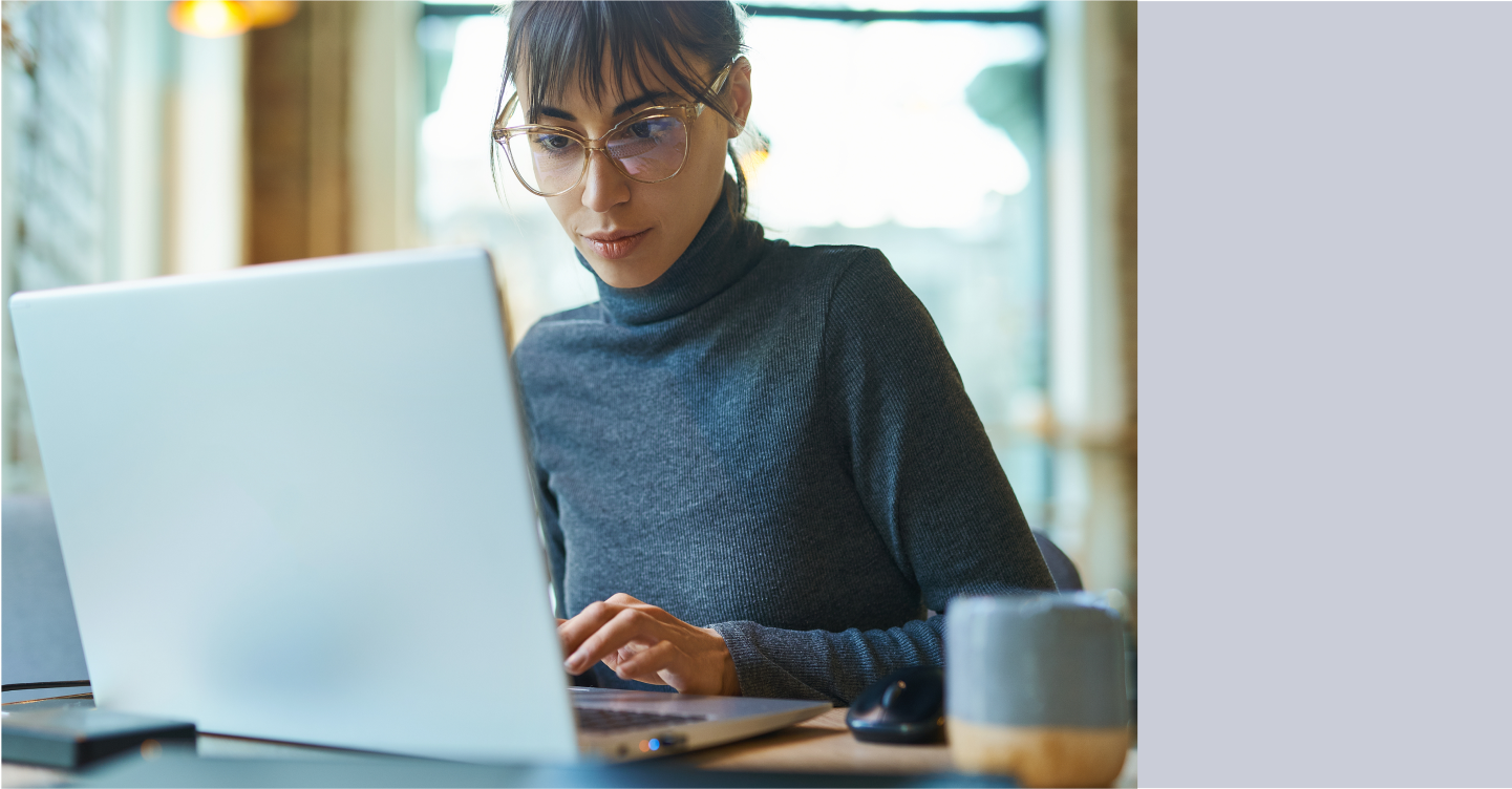 Developer building a Whatsapp commerce chatbot on her laptop