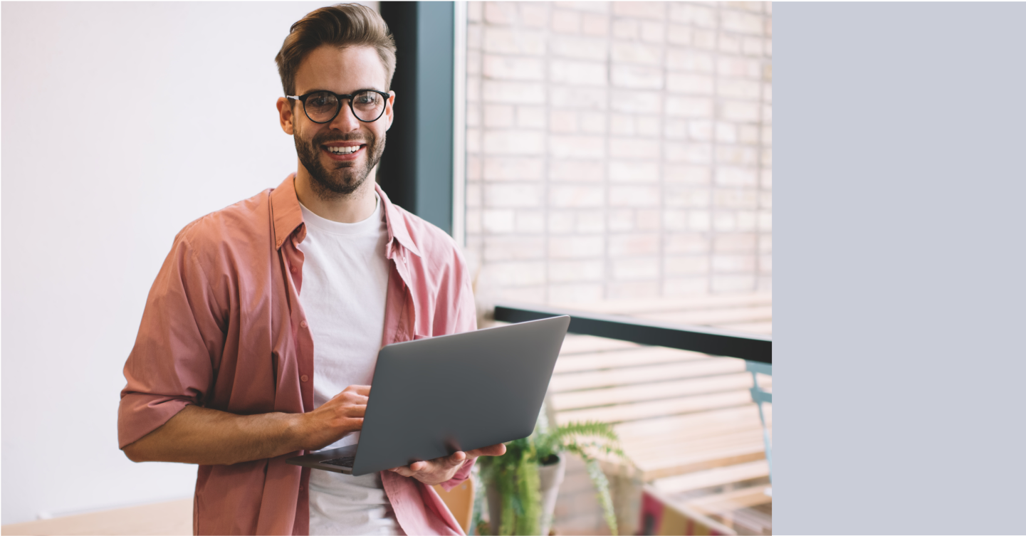 Developer smiling while working on a healthcare app