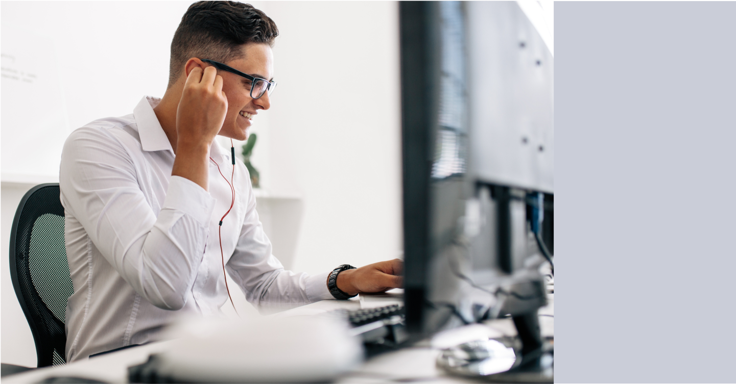 Person on a call on the computer using headphones