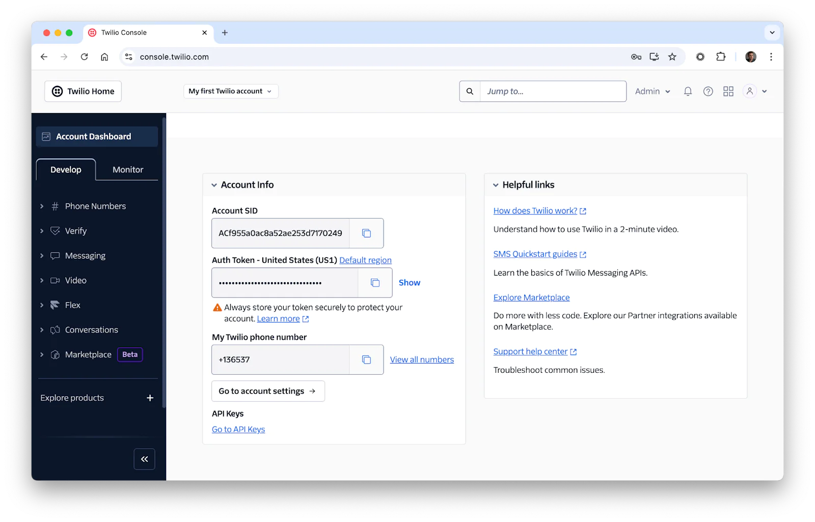 Twilio Console with account info, phone number, auth token, and helpful links. An image showing the Twilio Account Dashboard showcasing the locations of the users Account SID, Auth Token, and Twilio Phone Number.