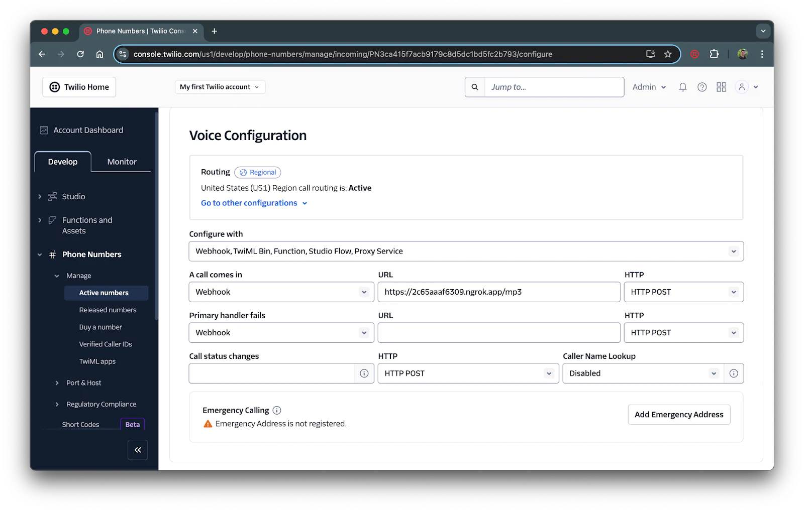 Twilio Console Voice Configuration page showing settings for incoming voice calls and configuring webhooks. Voice configuration section of a Twilio number showing the forwarding URL in the webhook URL textbox.