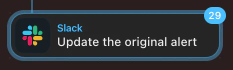 Slack app notification with the message Update the original alert and a badge showing number 29.