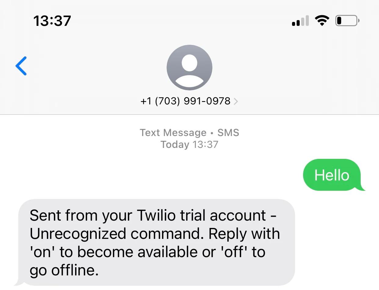 SMS conversation showing a green Hello message and a response from a Twilio trial account wrong command for sms