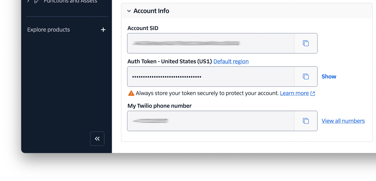 Screenshot of Twilio console displaying account SID, auth token, and phone number.
