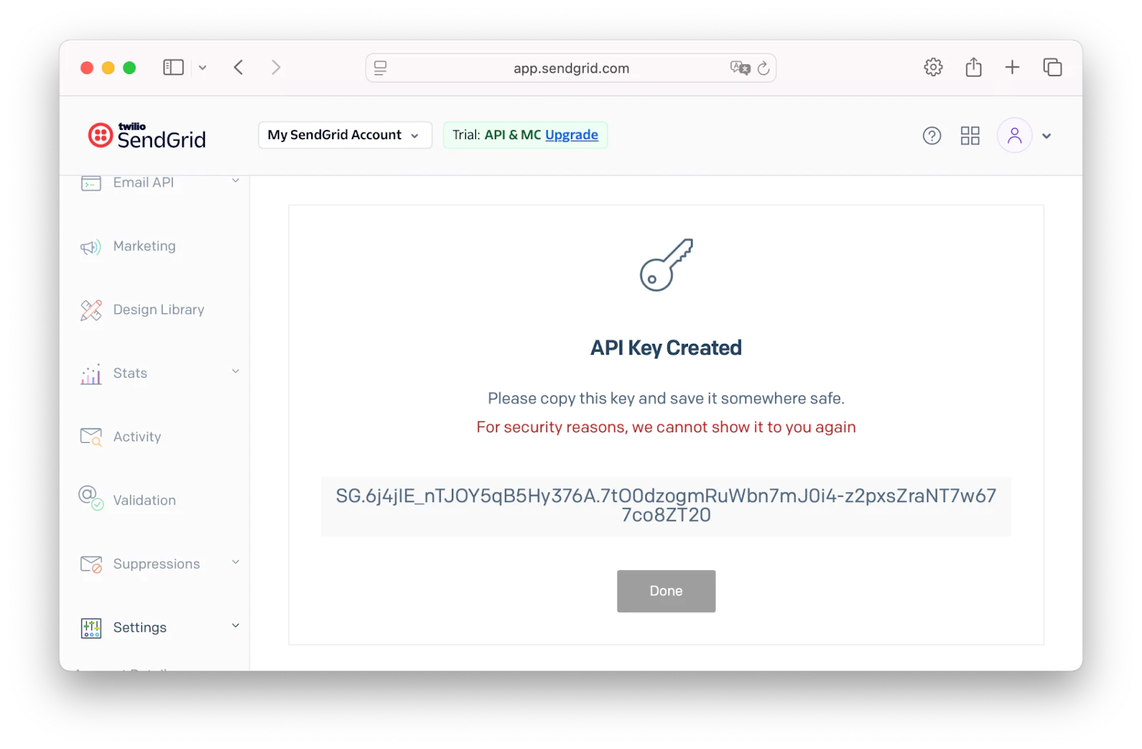 SendGrid dashboard showing API key creation with a warning to save the key securely.