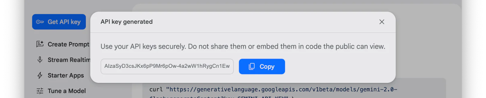 Dialog box displaying a generated API key with options to copy and a reminder to keep the key secure. Dialog box displaying a generated API key with options to copy and a reminder to keep the key secure.