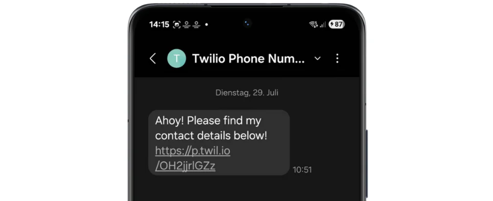 Smartphone screen showing a text message with a link to contact details from Twilio.