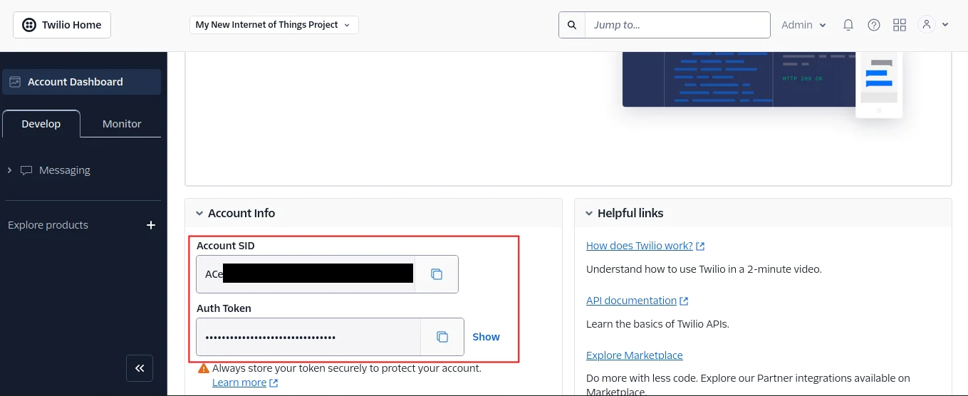 Twilio dashboard showing Account SID and Auth Token with covered information and helpful links on the right. Retrieving the Twilio credentials in the console