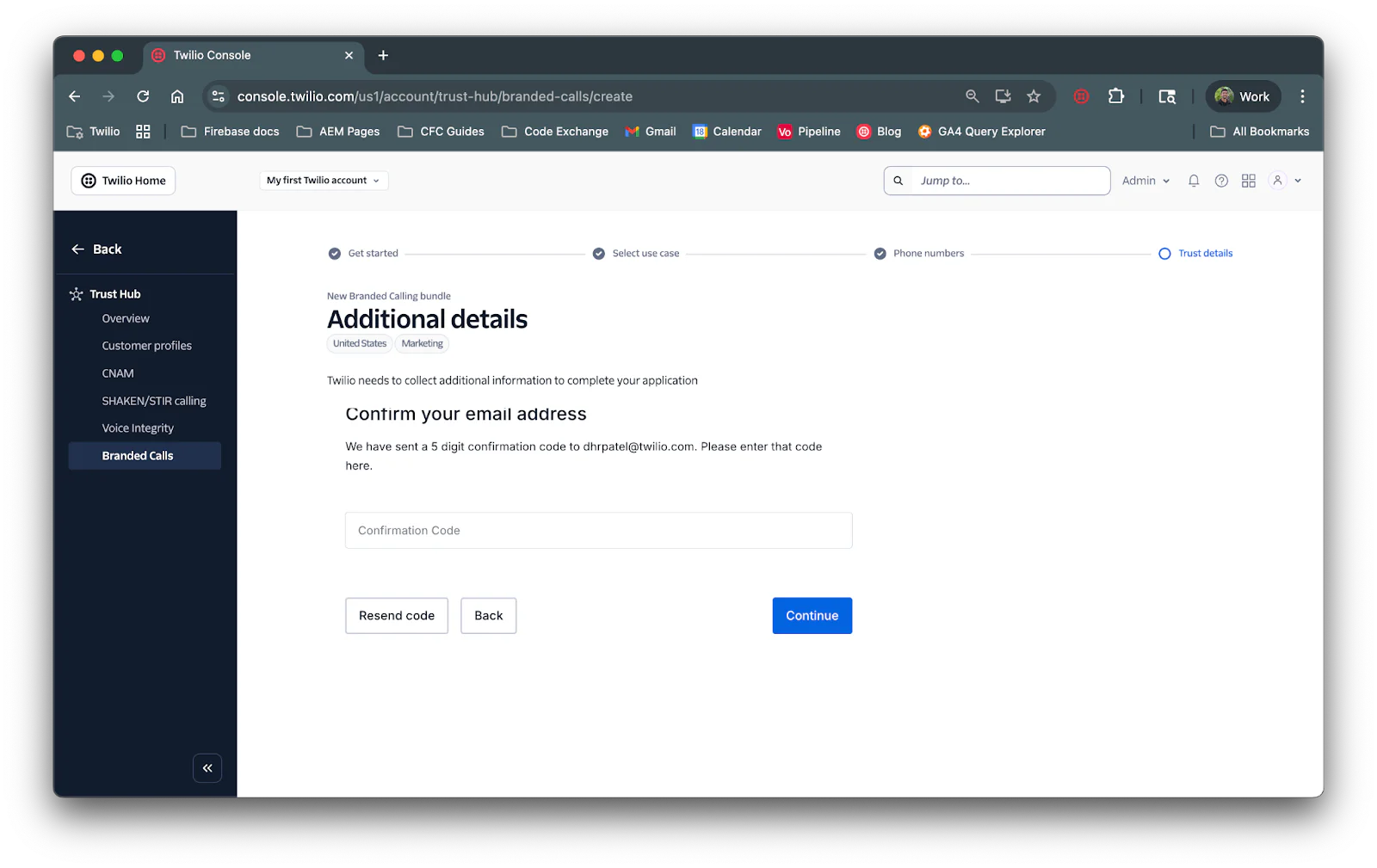 A screenshot of the Twilio Console page for branded calls showing step to confirm email address with a confirmation code.