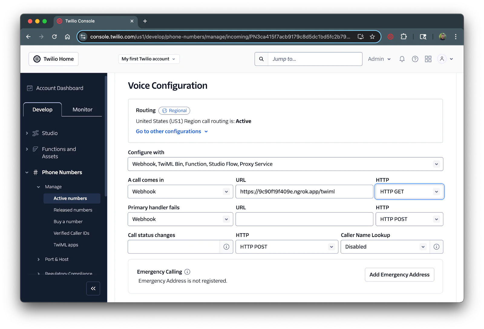 Screenshot of Twilio Voice Configuration settings in the developer console. Voice configuration section of a Twilio number showing the forwarding URL in the webhook URL textbox.
