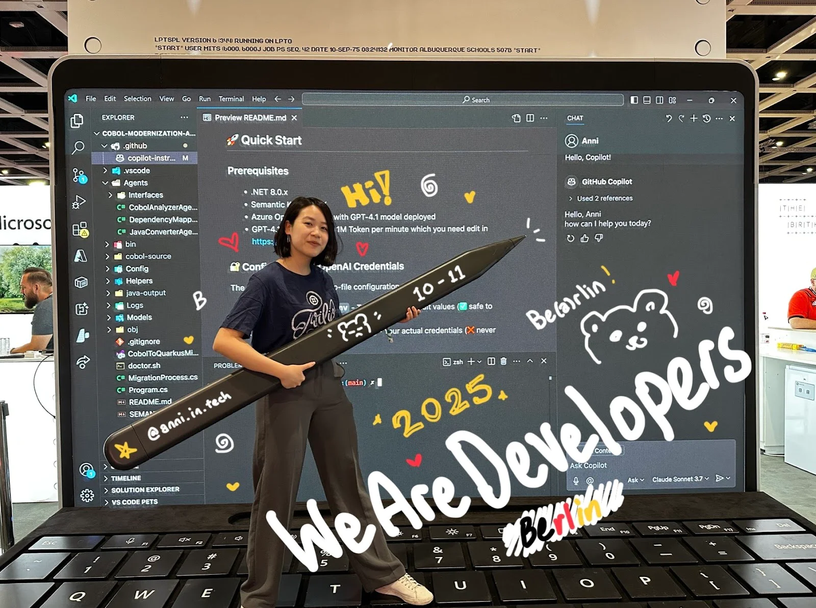 Anni on a gigantic laptop at WeAreDevelopers 2025 in Berlin