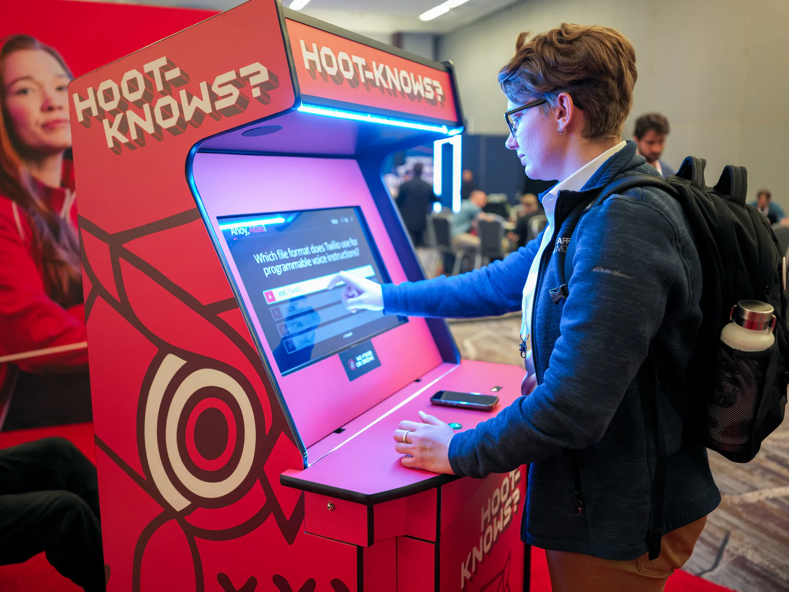 Individual touching screen on Hoot-Knows? quiz machine at a conference or event.