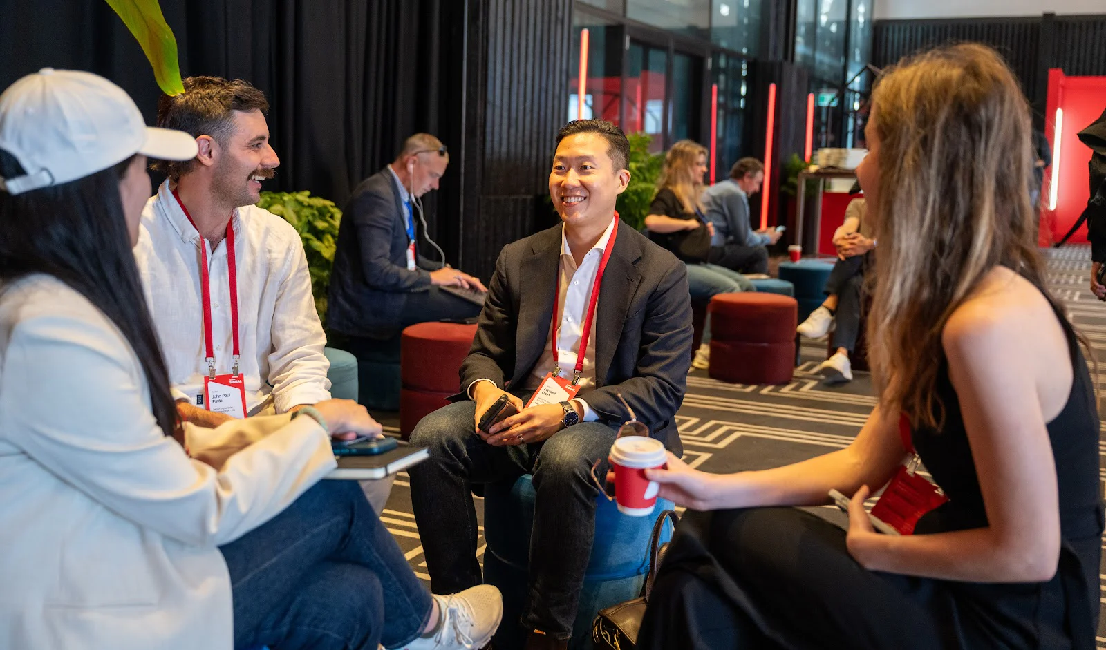 Four people having a conversation while seated at SIGNAL Sydney 2025