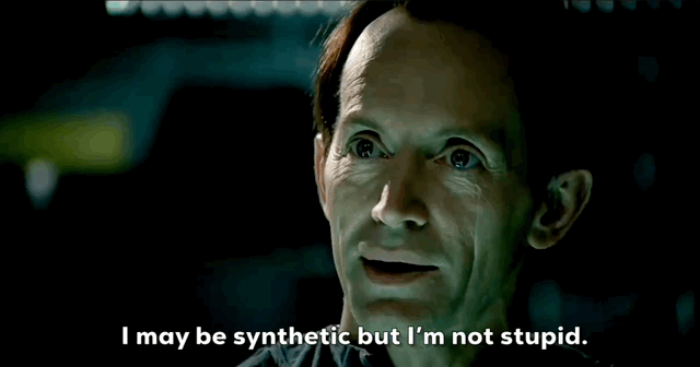 Man with pale skin saying I may be synthetic but I'm not stupid.