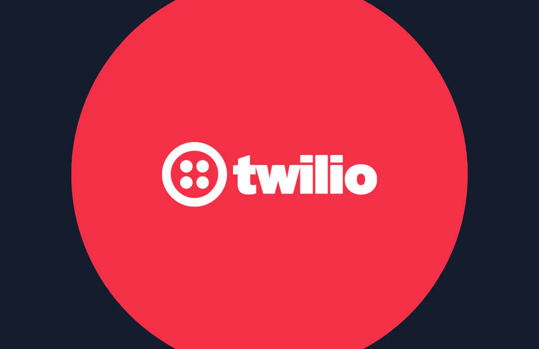 Twilio's logo featuring white text and icon on a red circle with a dark blue background.