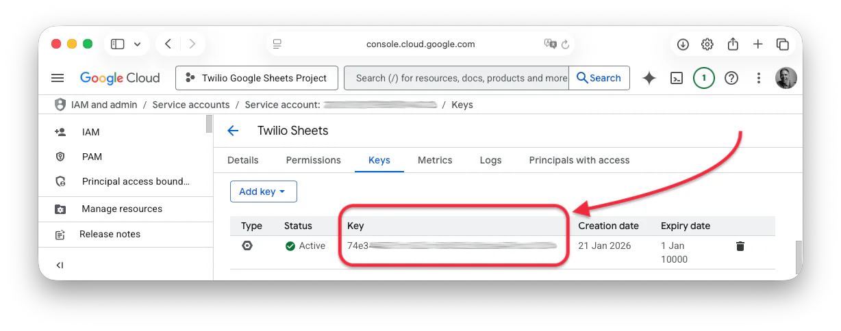 A screenshot of the Google Cloud Console in the "IAM and admin / Service accounts" section, where the Key field in the Keys table is redacted, but emphasised.
