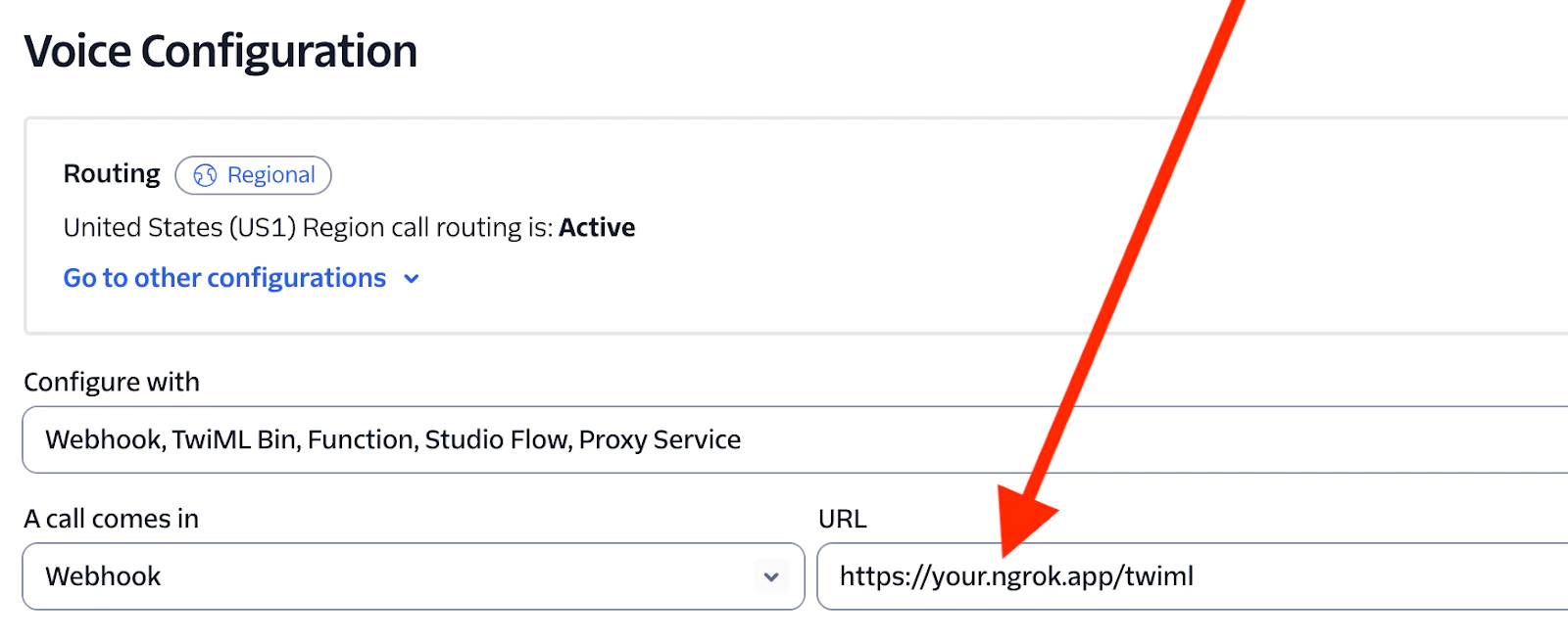 Screenshot of Twilio Voice Configuration page showing the webhook URL setup with an arrow pointing to the URL. Screenshot of Twilio Voice Configuration page showing the webhook URL setup with an arrow pointing to the URL.