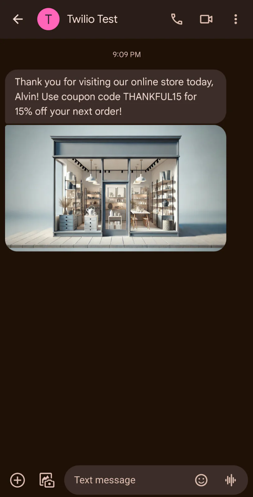 Text message with a discount code and storefront image Text message offering a discount code and an image of a modern storefront with large glass windows