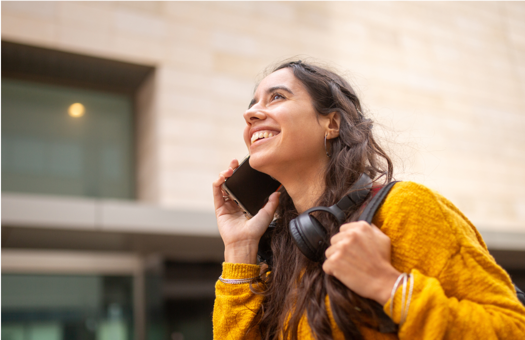 Girl in phone call learning the difference between contact center ACD and IVR