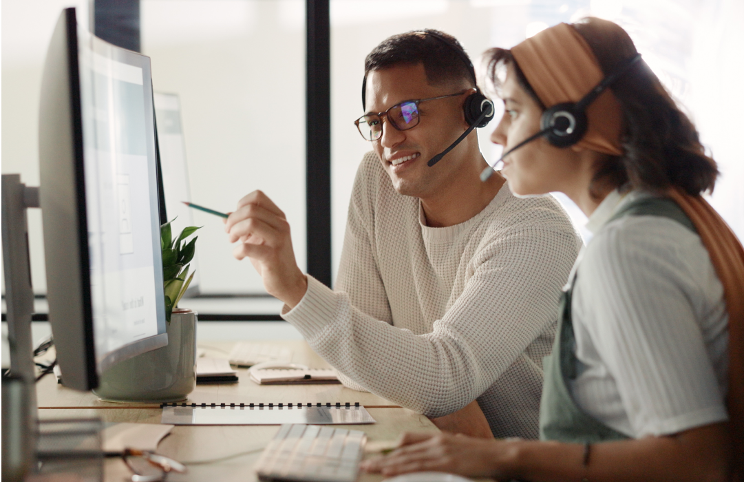 Colleagues analyzing the best software solutions for their company's contact center