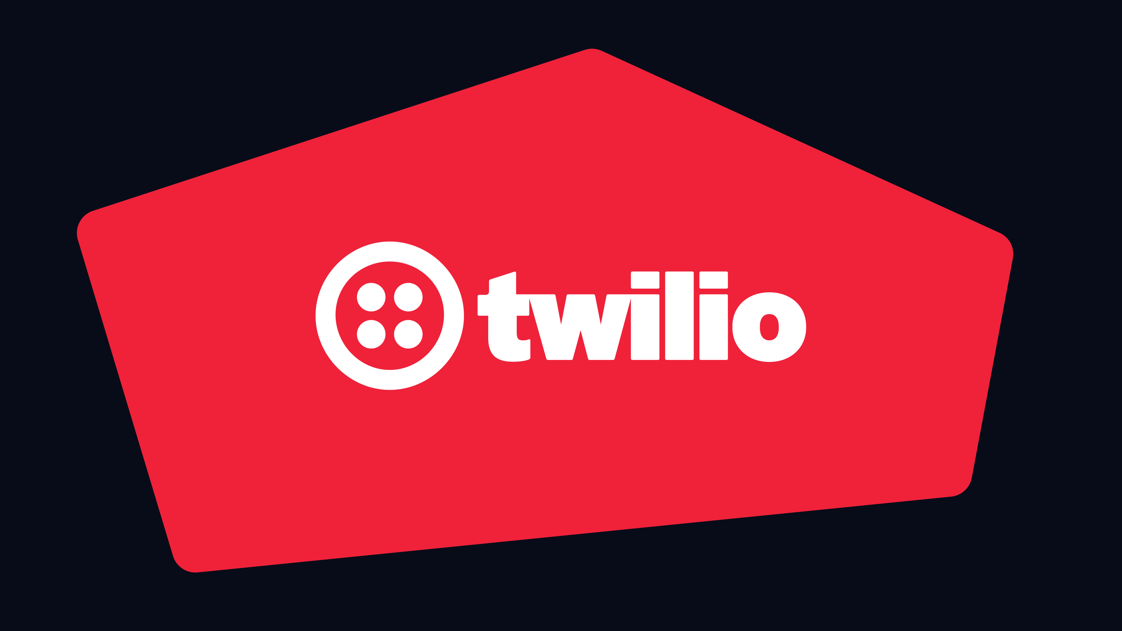 Twilio logo in white on a red pentagon shape with a black background.