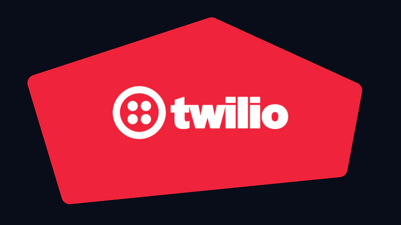 Twilio logo in white on a red pentagon shape with a black background.