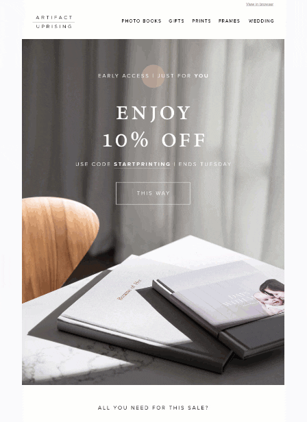 Artifact Uprising Early Access 10% Off Photo Books Promo Open books on a table with a 10% off promotional offer for Artifact Uprising products.