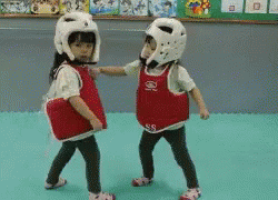 toddlers gently sparring