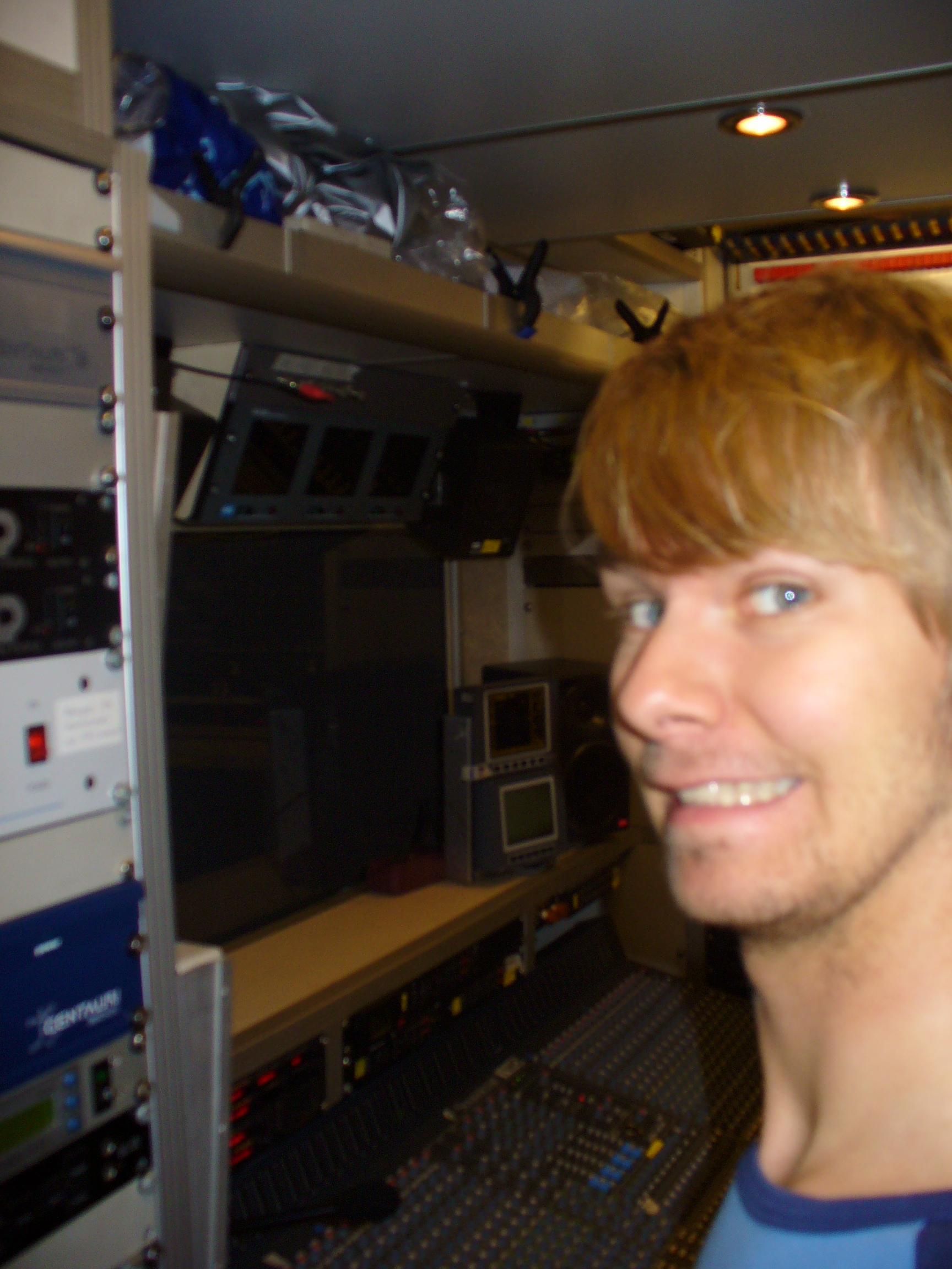 Stefan in front of an audio mixer