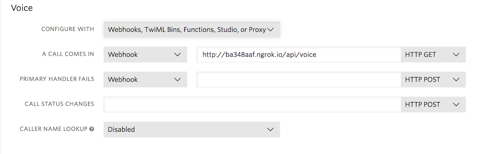 Twilio console detail showing Programmable Voice webhooks configuration.