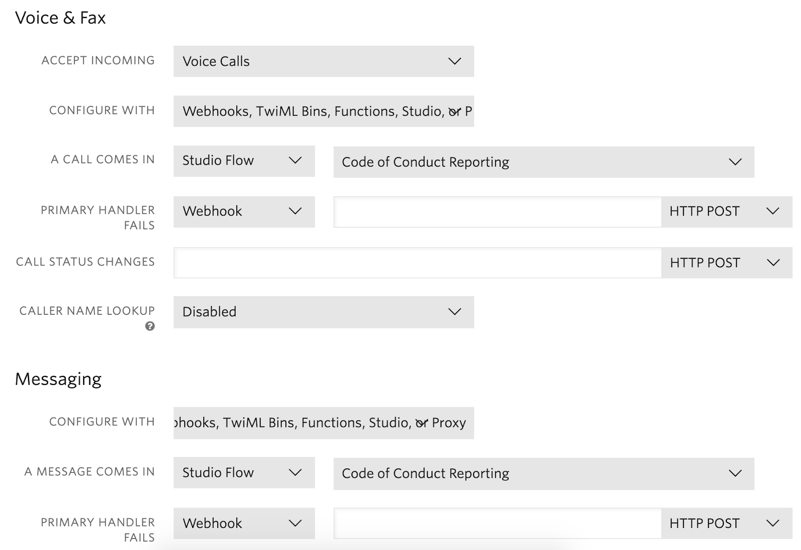 The UI for configuring Twilio phone numbers. Voice & Fax is configured to "Accept incoming Voice Calls", with "Webhooks, TwiML Bins, Functions, Studio." When a call comes in, use the "Code of Conduct Reporting" studio flow.  Messaging is configured with the same settings.