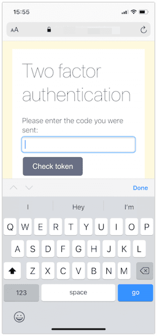 A web page shown in iOS Safari with a two factor authentication prompt. The standard alphabetical keyboard is open.